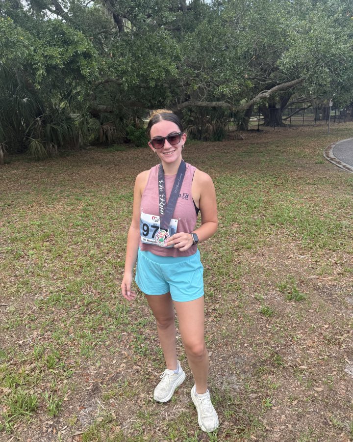 jasmine riggin at Luau 5K, 10K, & 13.1M at Largo, FL (21) - 05/23/2026 after earning 2nd FEMALE Overall