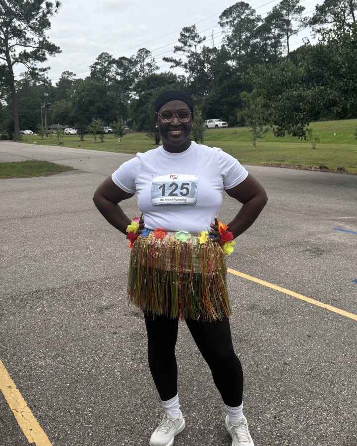 Alana Scott at Luau 5K, 10K, & 13.1M at Slidell, LA (20) - 05/16/2026 after earning Best Costume
