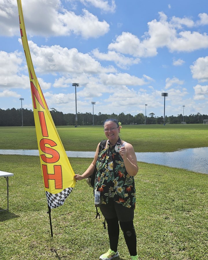 Cheri Johnson at Luau 5K, 10K, 13.1M at Fort Pierce, FL (20) - 05/16/2026 after earning Best Costume
