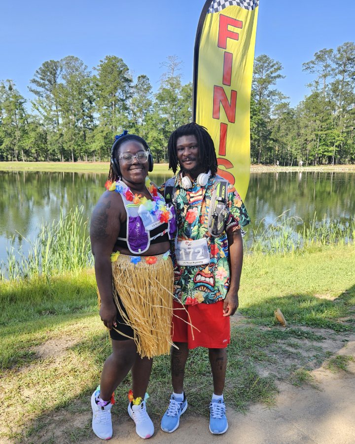 Taylor Thicklin and Nicholas Williams at Luau 5K, 10K, & 13.1M at Pooler, GA (20) - 05/16/2026 after earning Best Costume
