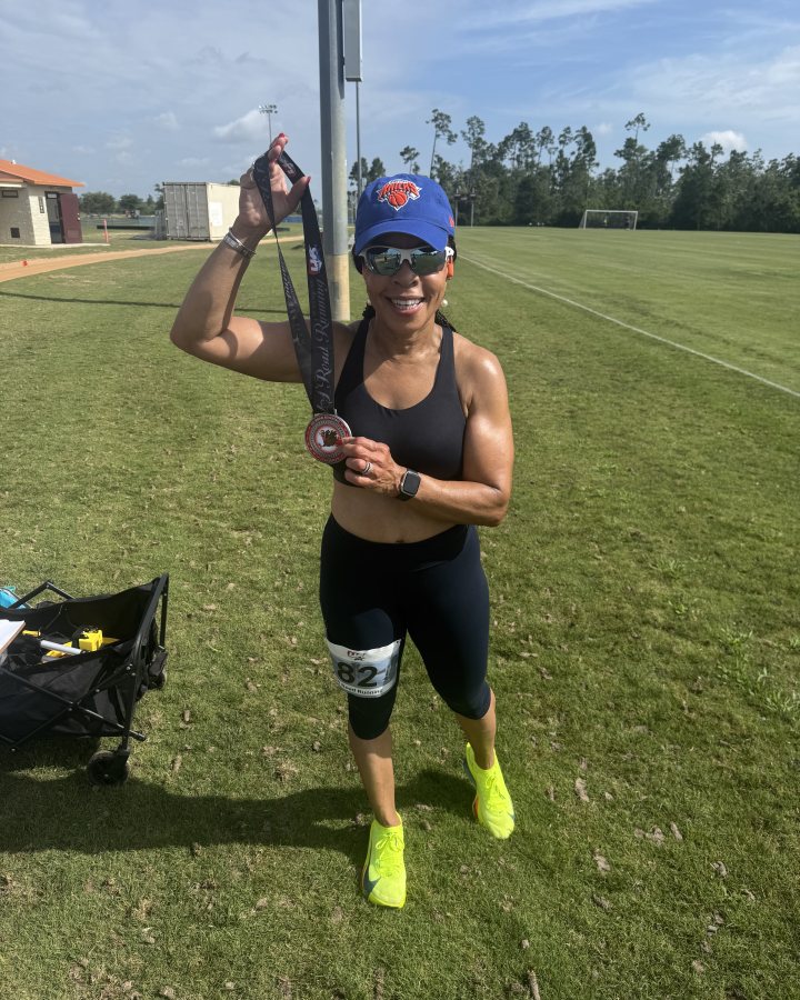 Kimberly Godwin at Medal Madness 5K, & 10K at Panama City, FL (23) - 06/06/2026 after earning 1st FEMALE Overall