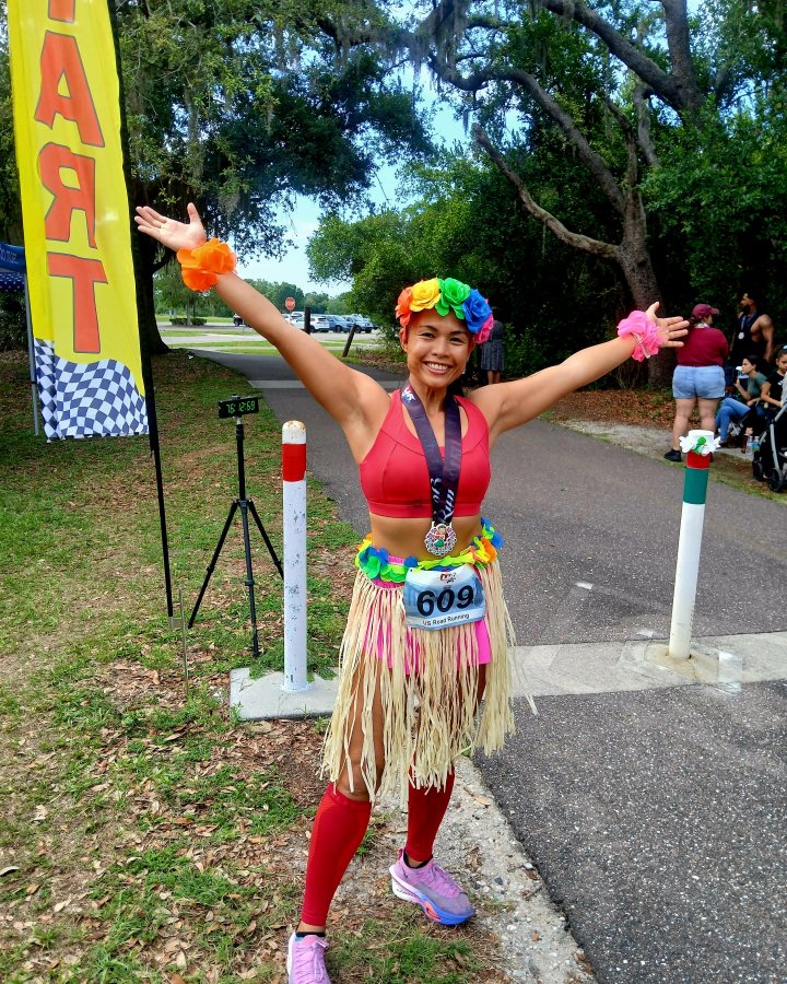 Janice McDonald at Luau 5K, 10K, & 13.1M at Largo, FL (21) - 05/23/2026 after earning Best Costume