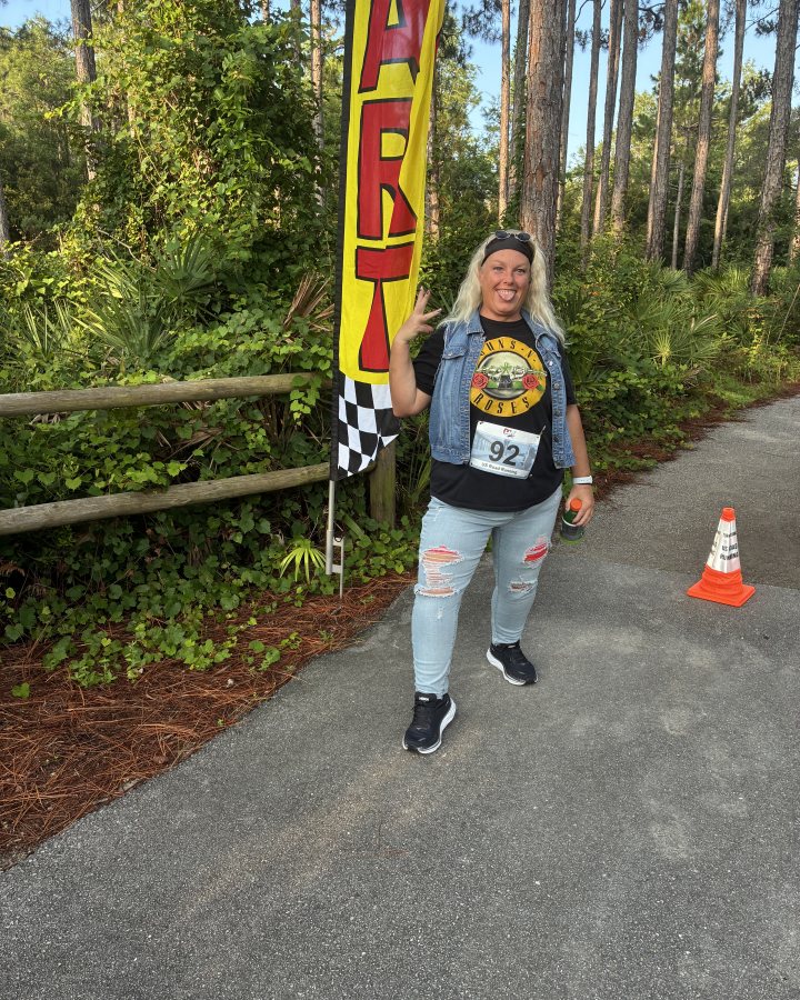 Malinda Sain at Medal Madness 5K, 10K, & 13.1M at Panama City Beach, FL (26) - 06/27/2026 after earning Best Costume