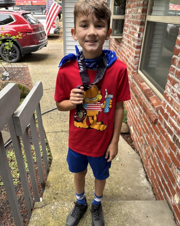 Ethan Zumwalt at Eagle 5K, 10K, & 13.1M at Camas, WA (30) - 07/25/2026 after earning Best Costume