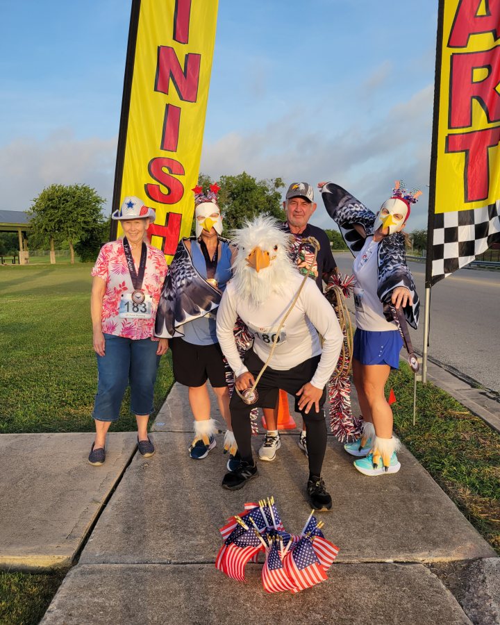 Bridget Mouton at Eagle 5K, 10K & 13.1M at Pflugerville, TX (30) - 07/25/2026 after earning Best Costume