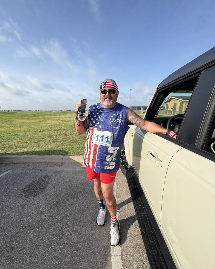 Lennie Dixon at Eagle 5K, 10K & 13.1M at Temple, TX (30) - 07/25/2026 after earning Best Costume