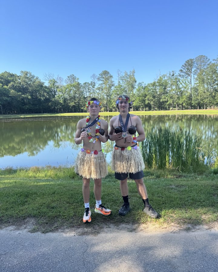 Logan Toomer at Luau 5K, 10K, & 13.1M at Pooler, GA (20) - 05/16/2026 after earning Best Costume