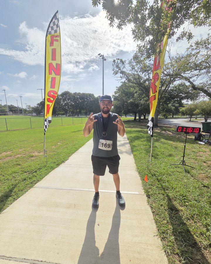 Tanner Hammond at Ninja 5K, 10K, & 13.1M at Mobile, AL (31) - 08/01/2026 after earning 2nd MALE Overall