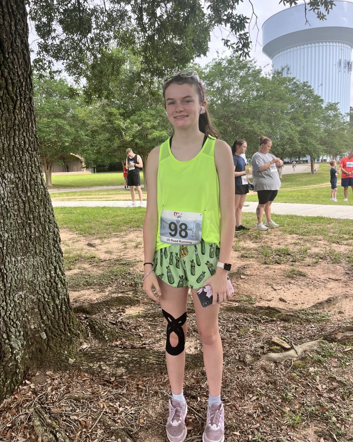 Charleigh Bailey at Medal Madness 5K, 10K, & 13.1M at Mobile, AL (23) - 06/06/2026 after earning Best Costume