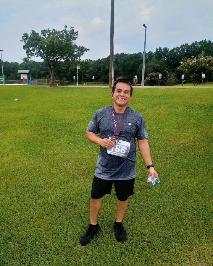 Estrael Valencia at Ninja 5K, 10K, & 13.1M at Piedmont, AL (31) - 08/01/2026 after earning 1st MALE Overall