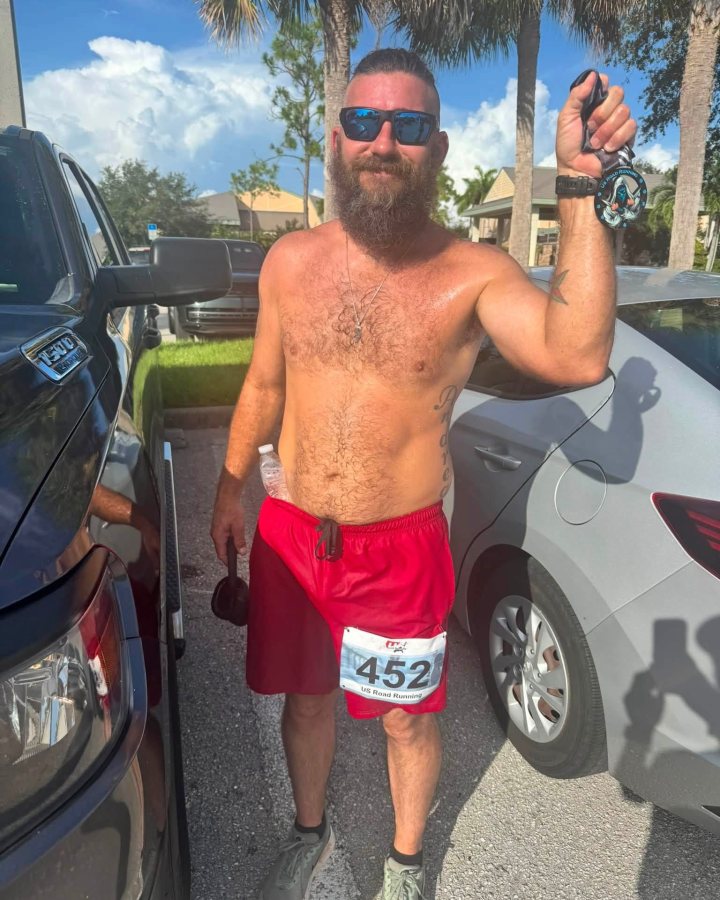 Andy Frields at Ninja 5K, 10K, & 13.1M at Naples, FL (32) - 08/08/2026 after earning 1st MALE Overall
