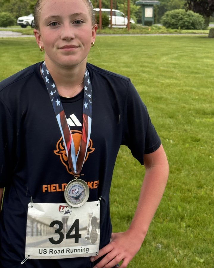 Avery Buch at Luau 5K, 10K, & 13.1M at Hughesville, PA (21) - 05/23/2026 after earning 1st FEMALE Overall