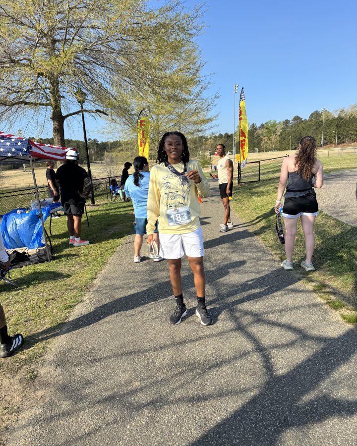 Akia Dunlap at Pirate 5K, 10K, & 13.1M at Williamsburg, VA (14) - 04/04/2026 after earning 1st FEMALE Overall