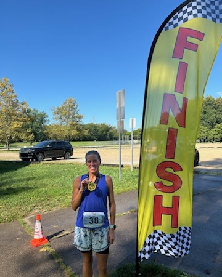 Megan King at Medal Madness 5K, 10K, & 13.1M at Beavercreek, OH (36) - 09/05/2026 after earning 1st FEMALE Overall