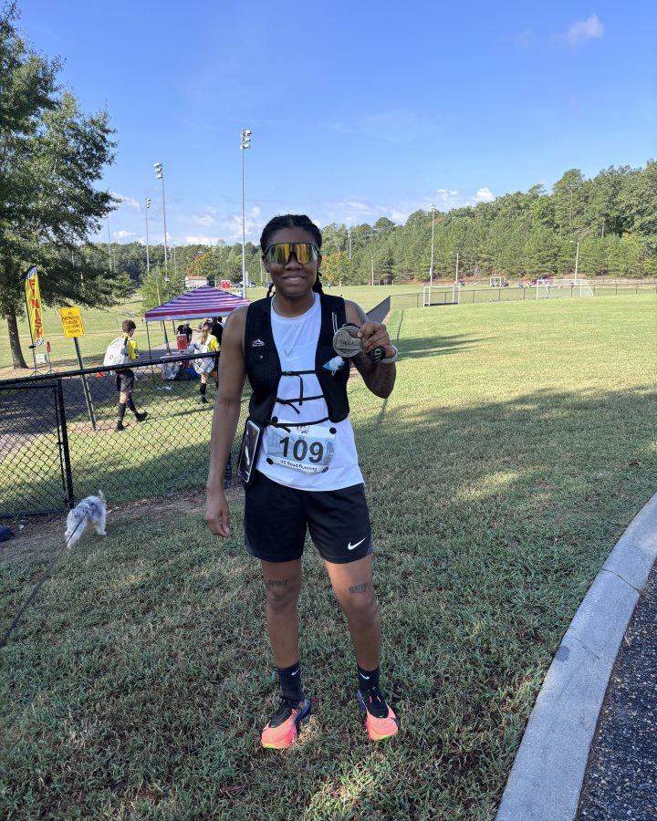 Akia Dunlap at Medal Madness 5K, 10K & 13.1M at Williamsburg, VA (38) - 09/19/2026 after earning 2nd FEMALE Overall