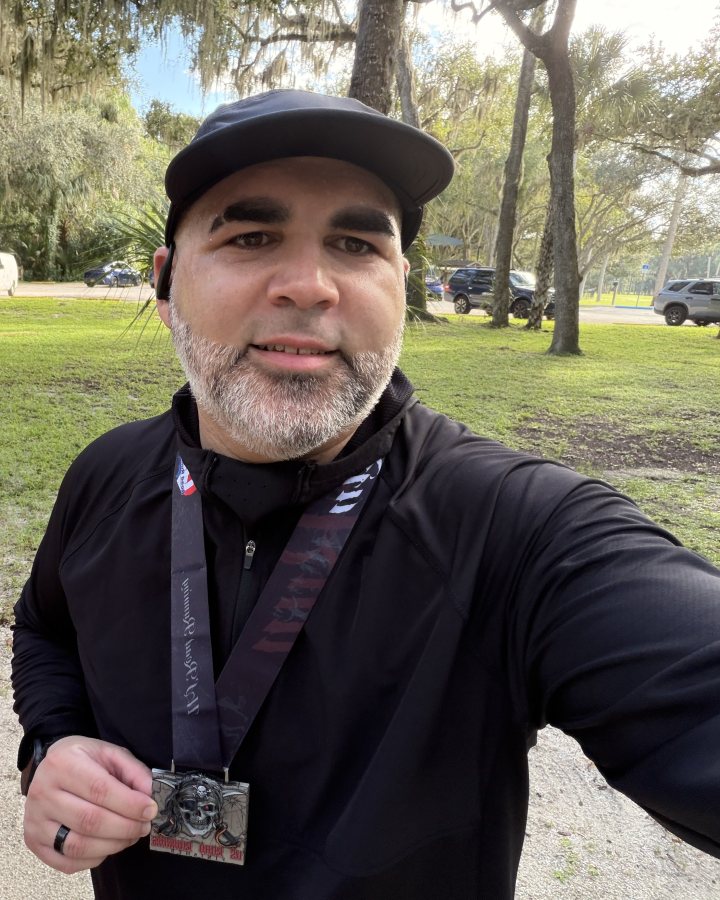 Janpaul Trinta Perez at Medal Madness 5K, 10K, & 13.1M at DeBary, FL (38) - 09/19/2026 after earning 3rd MALE Overall