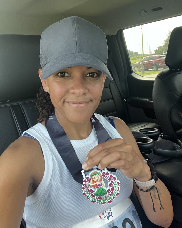 Daiharis Acosta at Medal Madness 5K, 10K, & 13.1M at Ocala, FL (38) - 09/19/2026 after earning 1st FEMALE Overall