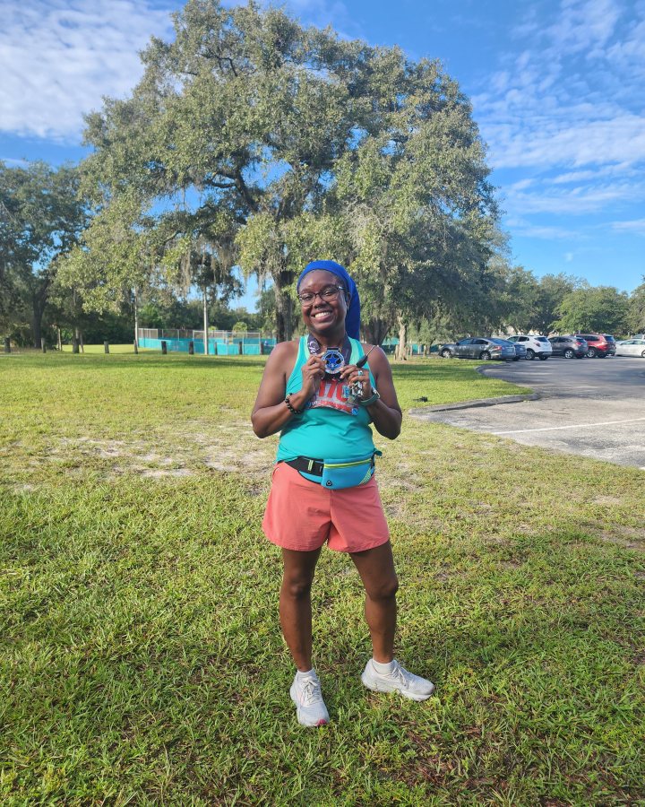 Brittney Schwan at Medal Madness 5K, 10K, & 13.1M at Hudson, FL (38) - 09/19/2026 after earning 3rd FEMALE Overall
