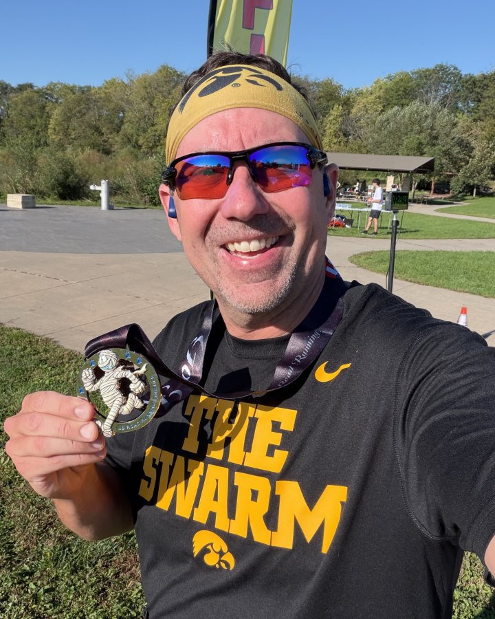 Matthew Smith at Haunted 5K, 10K, & 13.1M at Iowa City, IA (40) - 10/03/2026 after earning 1st MALE Overall