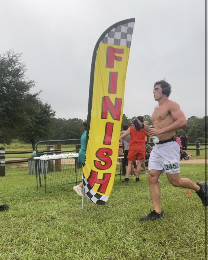 Hunter Bowles at Haunted 5K, 10K & 13.1M at Tallahassee, FL (40) - 10/03/2026 after earning 3rd MALE Overall