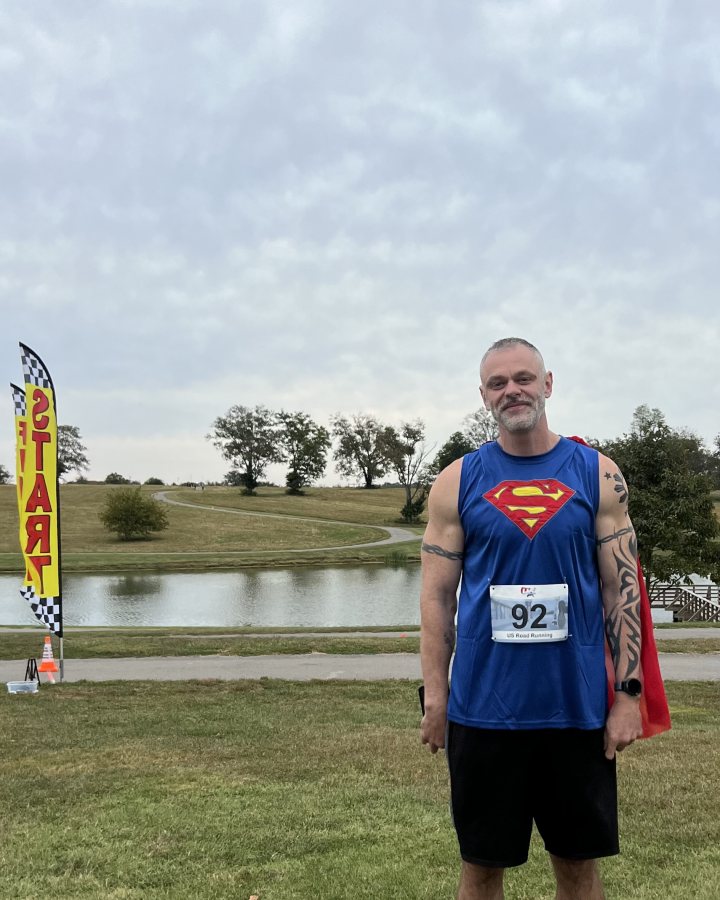 Jason Woods at Medal Madness 5K, 10K & 13.1M at Richmond, KY (18) - 05/09/2026 after earning Best Costume