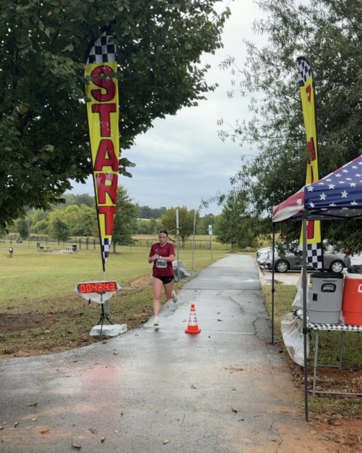 Sydney Bemis at Haunted 5K, 10K, 13.1M & 26.2M at Winston-Salem, NC (41) - 10/10/2026 after earning 1st FEMALE Overall