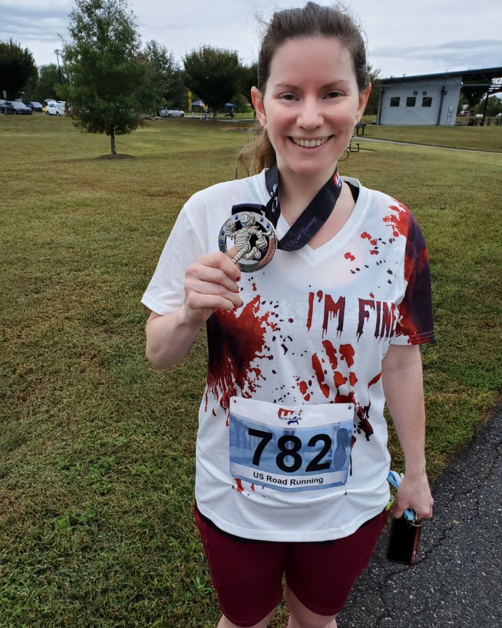 Amanda Lee at Haunted 5K, 10K, 13.1M & 26.2M at Winston-Salem, NC (41) - 10/10/2026 after earning Best Costume