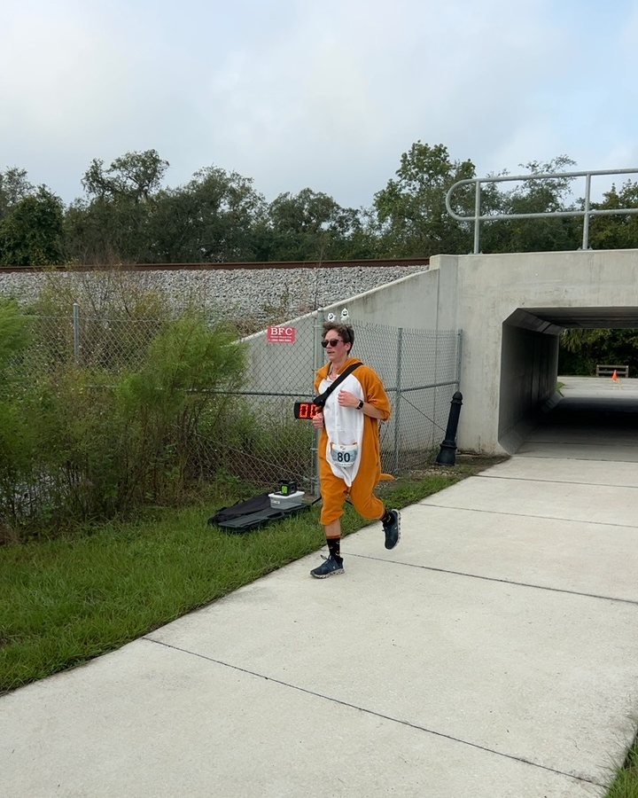 Joshua Hood at Haunted 5K, 10K, & 13.1M at Deland, FL (41) - 10/10/2026 after earning Best Costume