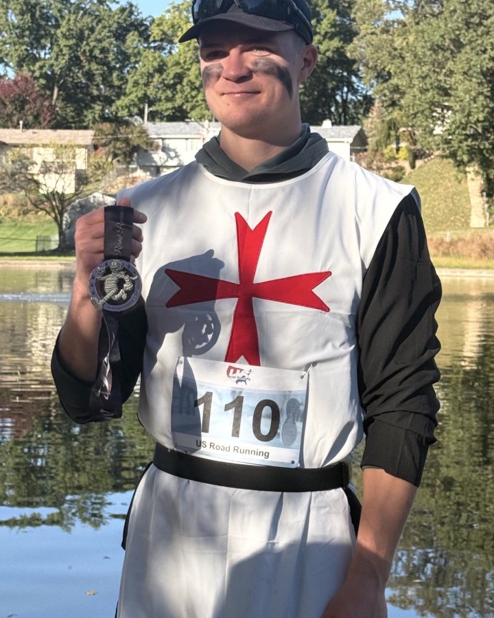 Bergen Perry at Haunted 5K, 10K, 13.1M & 26.2M at Bettendorf, IA (42) - 10/17/2026 after earning Best Costume
