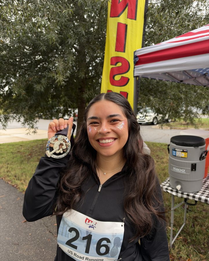 Galilee Lopez at Haunted 5K, 10K & 13.1M at Winston-Salem, NC (42) - 10/17/2026 after earning 3rd FEMALE Overall