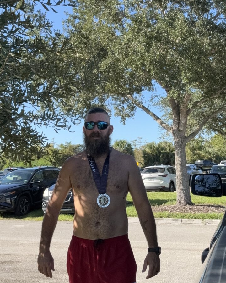 Andrew Frields at Haunted 5K, 10K, & 13.1M at Naples, FL (43) - 10/24/2026 after earning 3rd MALE Overall